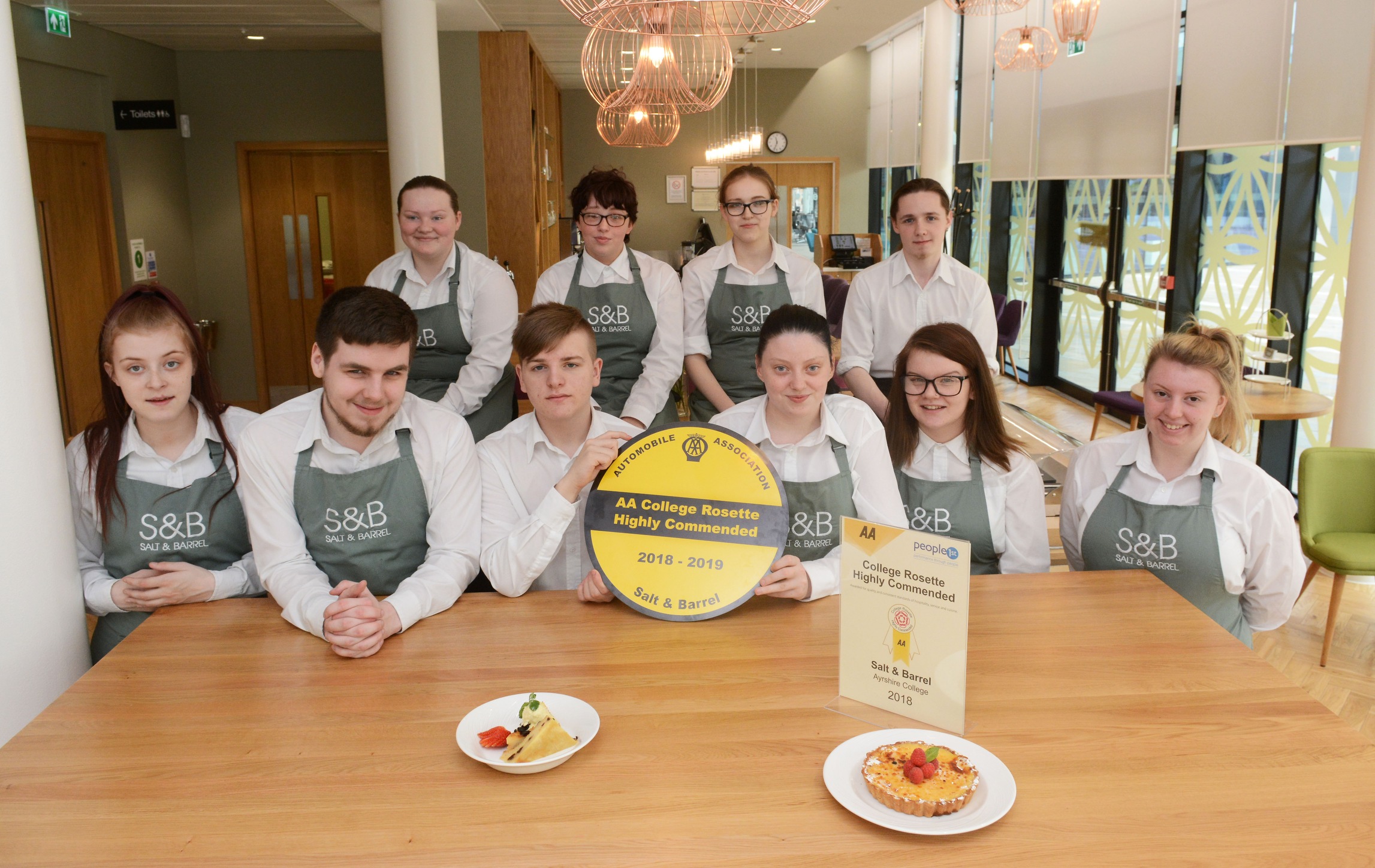 Salt & Barrel hospitality students with the AA College Rosette