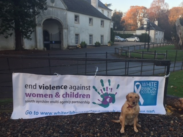 16 days of Action.dog and sign.jpg