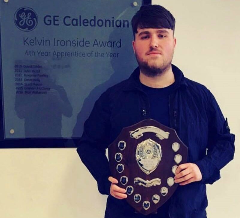 GE Caledonian's Aidan McIntyre holding a trophy